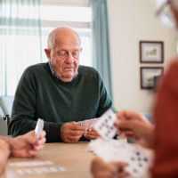 senior-people-playing-cards-2021-09-02-08-35-18-utc